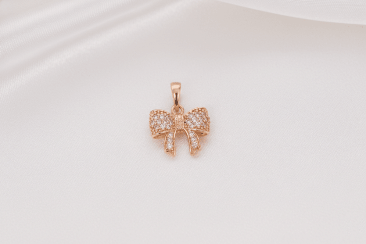 DIJE MOÑO CON RELLENO DE ZIRCONES-DIJES-JOYERIA D'ORÉ-ORO LAMINADO 18K CALI