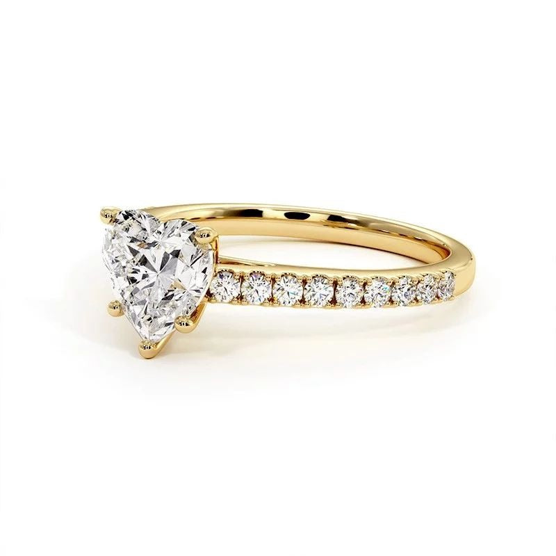 ANILLO CORAZÓN CON REBORDE EN ZIRCONES
