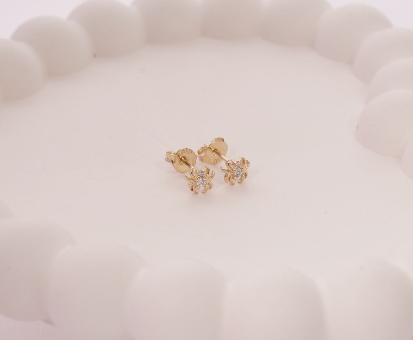 TOPO ARAÑA CON 2 ZIRCONES-TOPOS-JOYERIA D'ORÉ-ORO LAMINADO 18K CALI