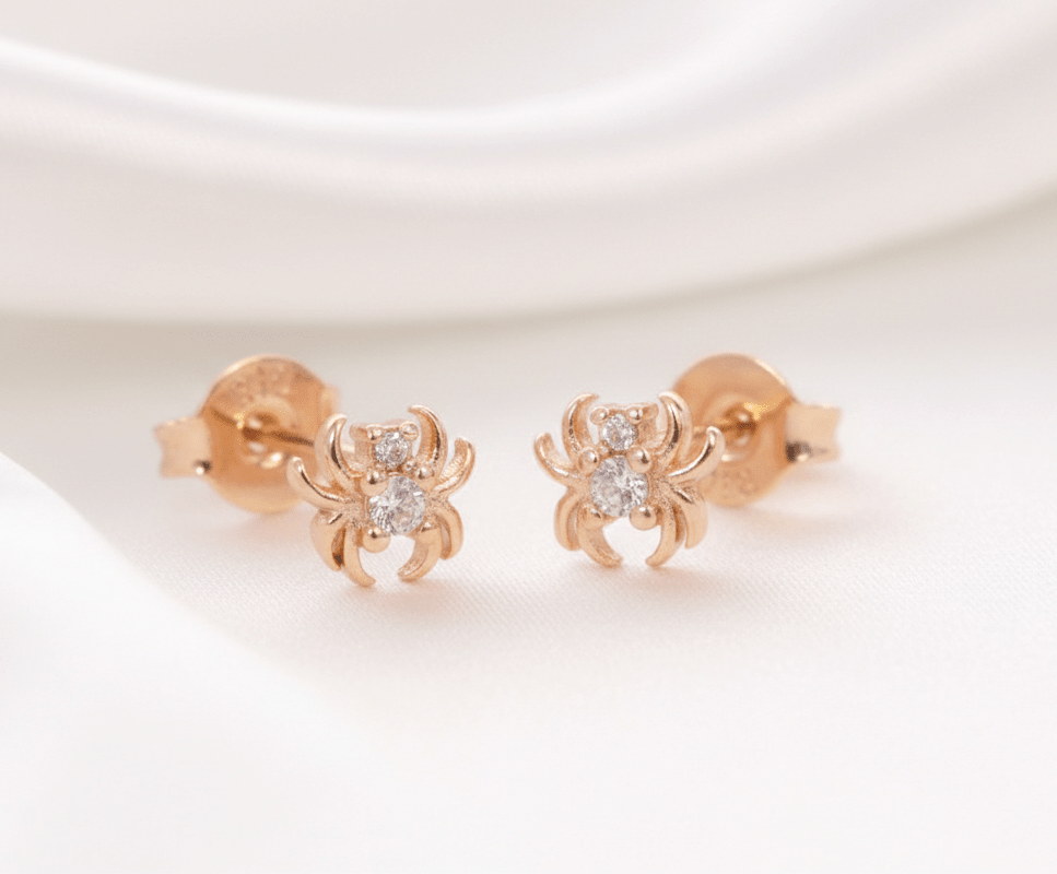 TOPO ARAÑA CON 2 ZIRCONES-TOPOS-JOYERIA D'ORÉ-ORO LAMINADO 18K CALI