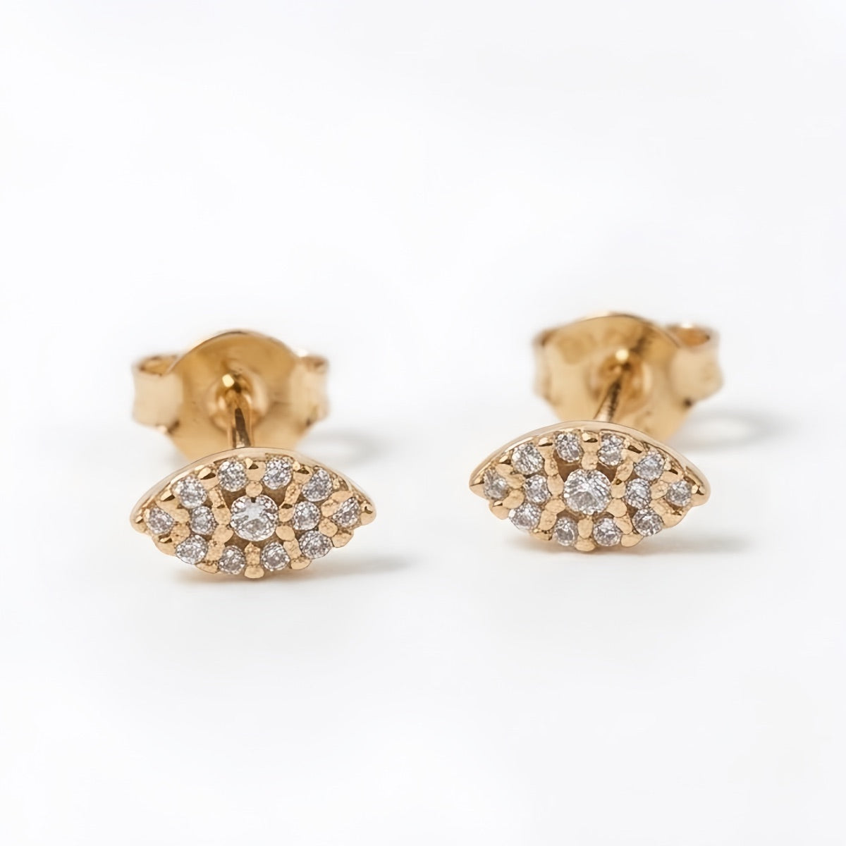 TOPO OJO TURCO CON ZIRCONES BLANCOS oro laminado 18k cali